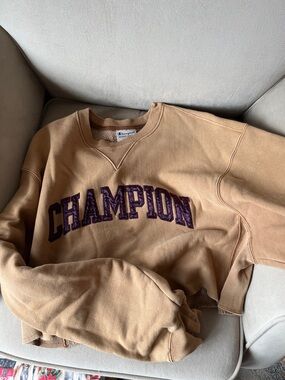 Cropped Champion Cropped Crewneck in Camel with Purple Logo